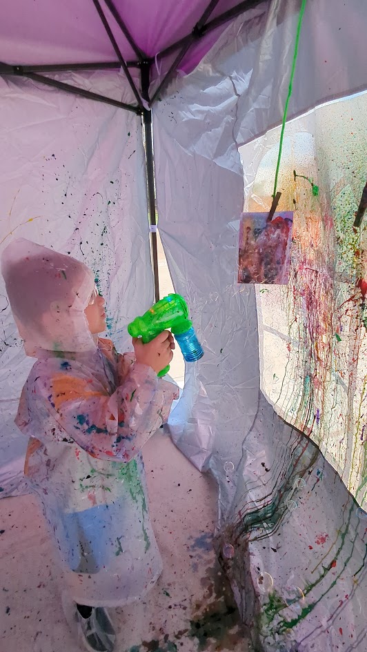 Vertical view of SIS splatter paint artwork